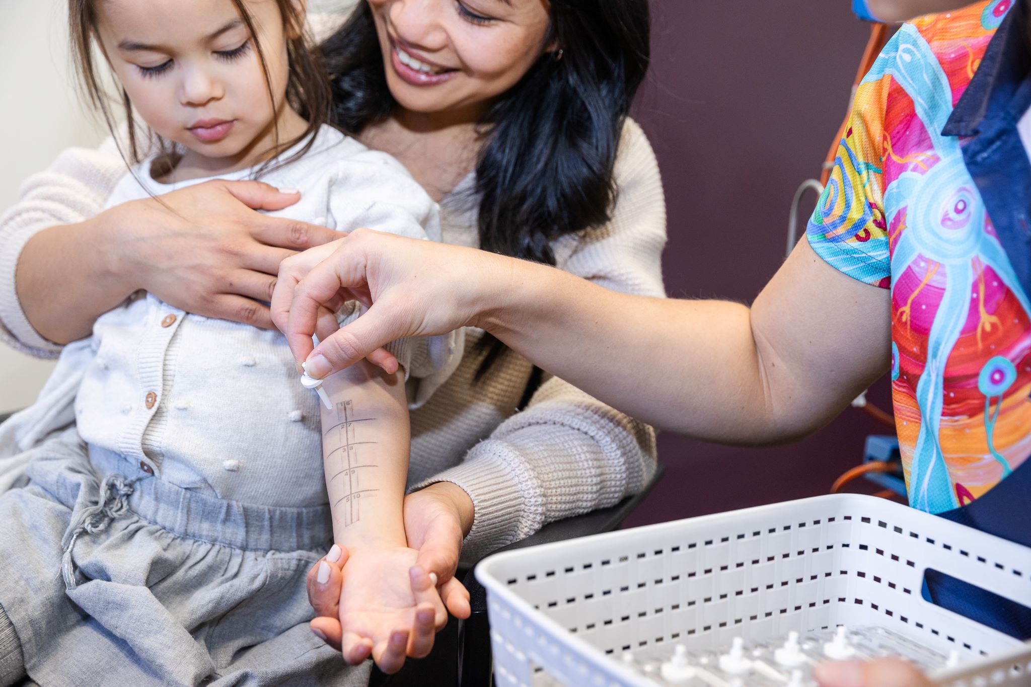 Young girl getting a skinprick test for allergies