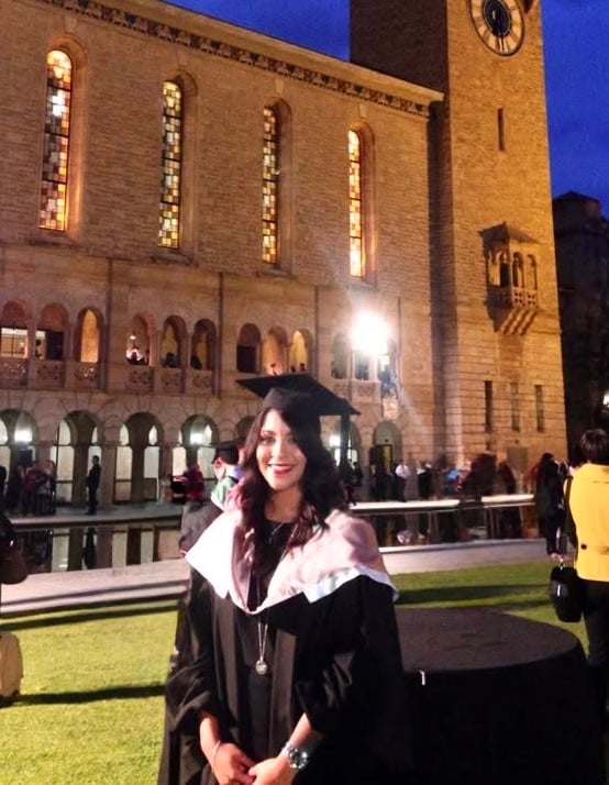 Alexis graduating at night